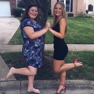 black form fitting dress with diamond back straps